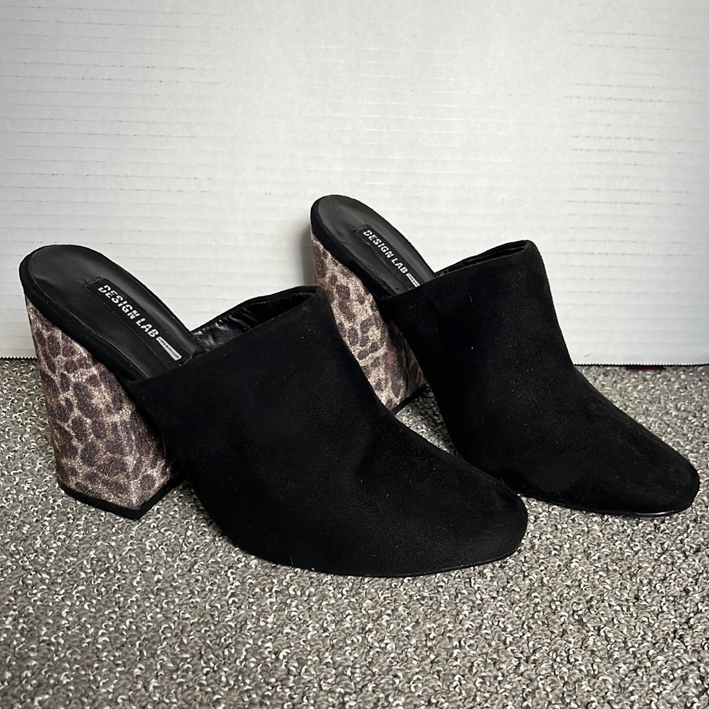Black slip on mule with chunky leopard heel.
